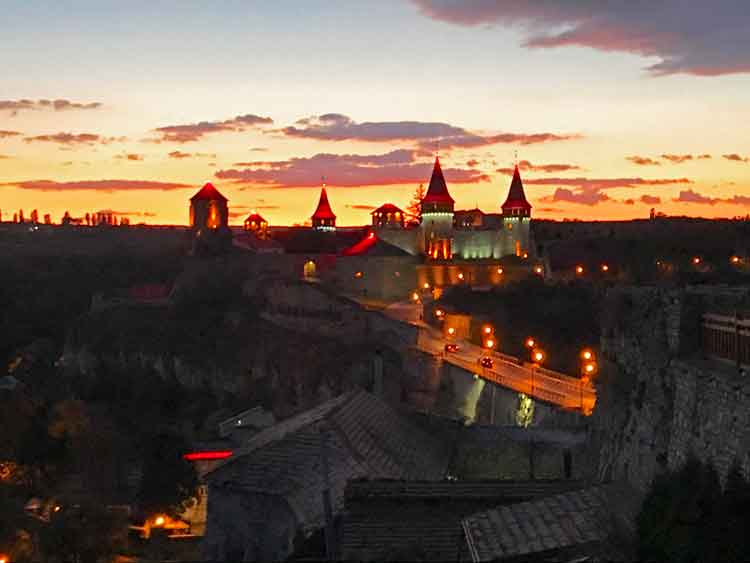 The fortress lit up at sunset in Kamianets-Podilskyi. Photo by Amanda Renna
