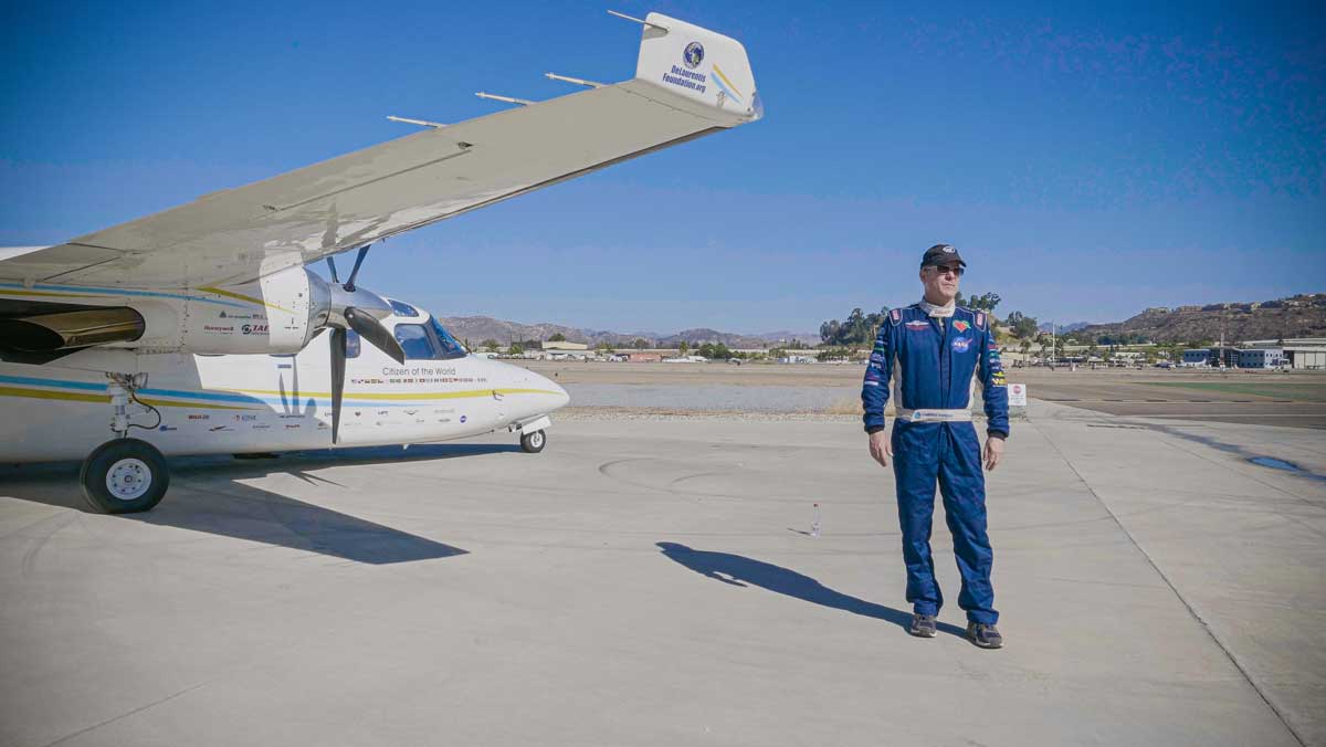 Pilot Robert DeLaurentis with his plane