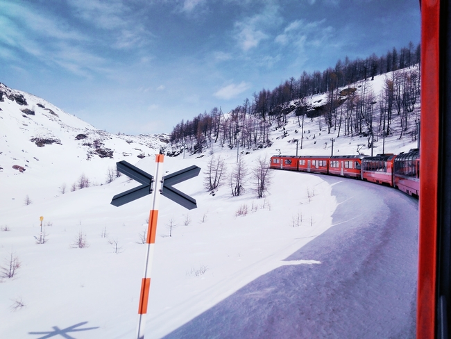  The Glacier Express Traverses a Winter Wonderful in Switzerland. Photo by 13533766401/Dreamstime.com