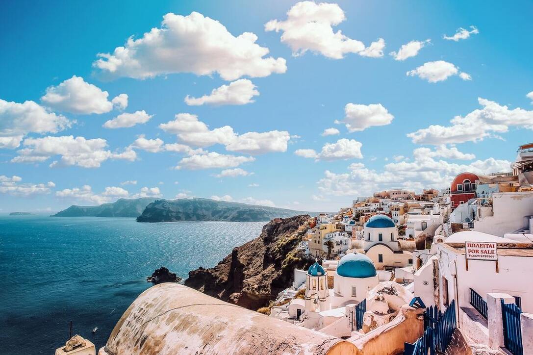 Beautiful view of blue ocean under the sky in Santorini, Greece