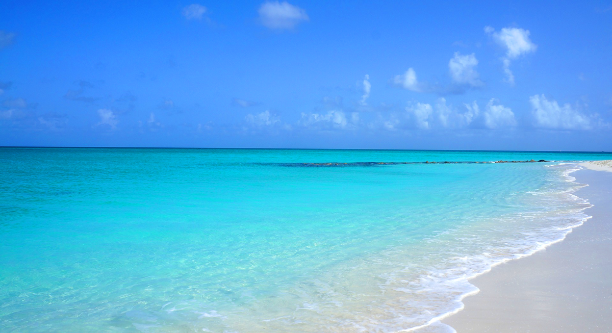 A quiet beach in Turks and Caicos. Read our Travel Guide to Turks and Caicos: Top Things to Do