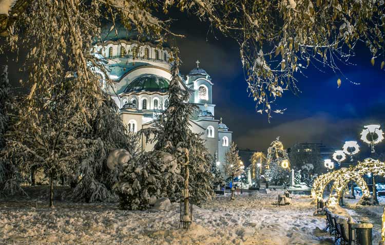 Snow covered Temple of St. Sava during the holidays.