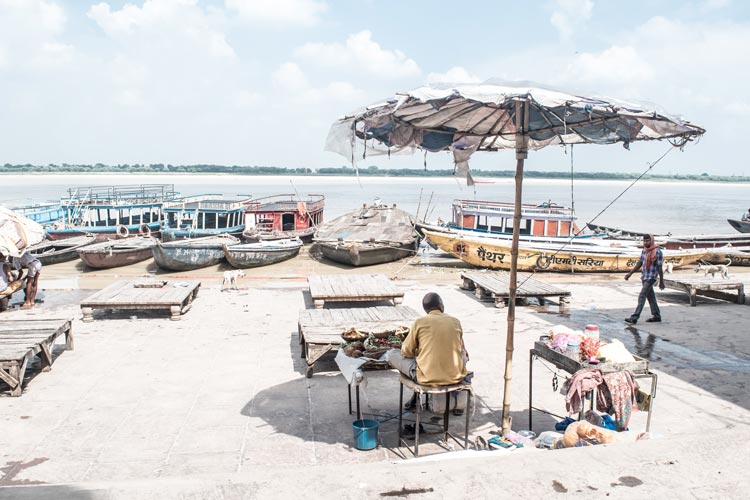 A merchant selling his items along the Ganges River.