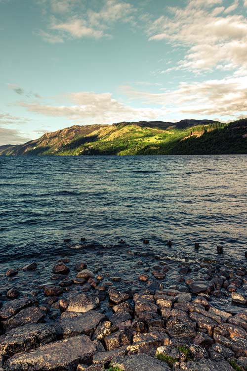 The deep, dark blue water of the Loch Ness Lake.