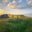 A family camping on the coast