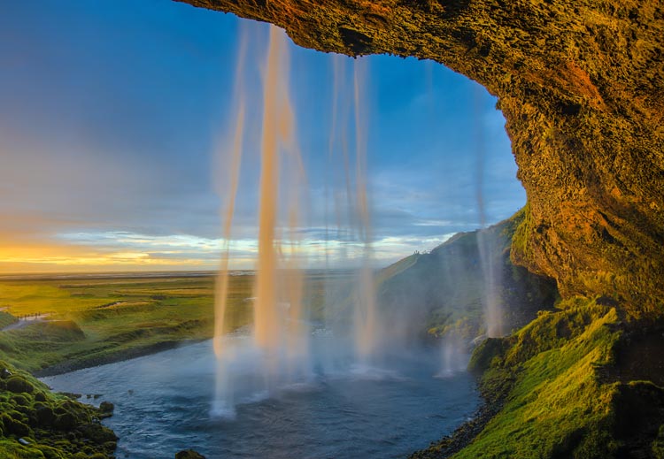 An inside look of a waterfall in Seljalandsfoss, Iceland