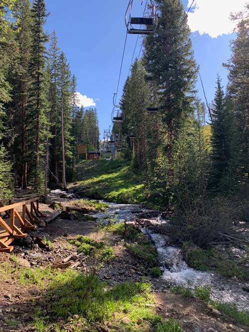 When the lifts aren't taking skiiers up the mountain they float above mountain creeks and summer peaks.