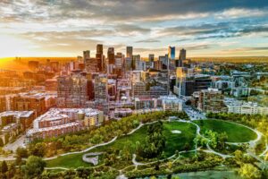 Denver's downtown skyline catches the evening light, with the city's mix of glass towers and green parkland showcasing why Colorado's capital draws visitors year-round. Photo courtesy of Visit Denver