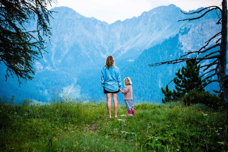 Mother and daughter travel to see different mountains.