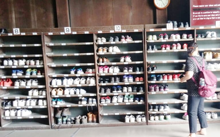 Shelves of shoes are rampant throughout Japan. Photo by Fyllis Hockman