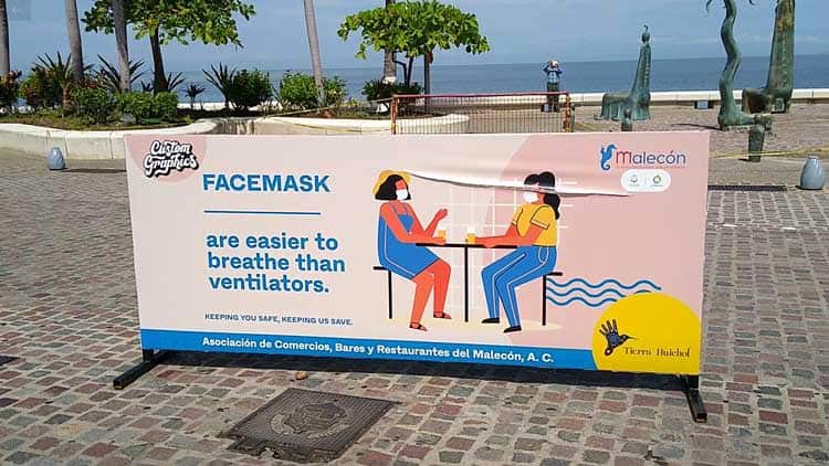 Reminders to wear face masks around the popular beach area.