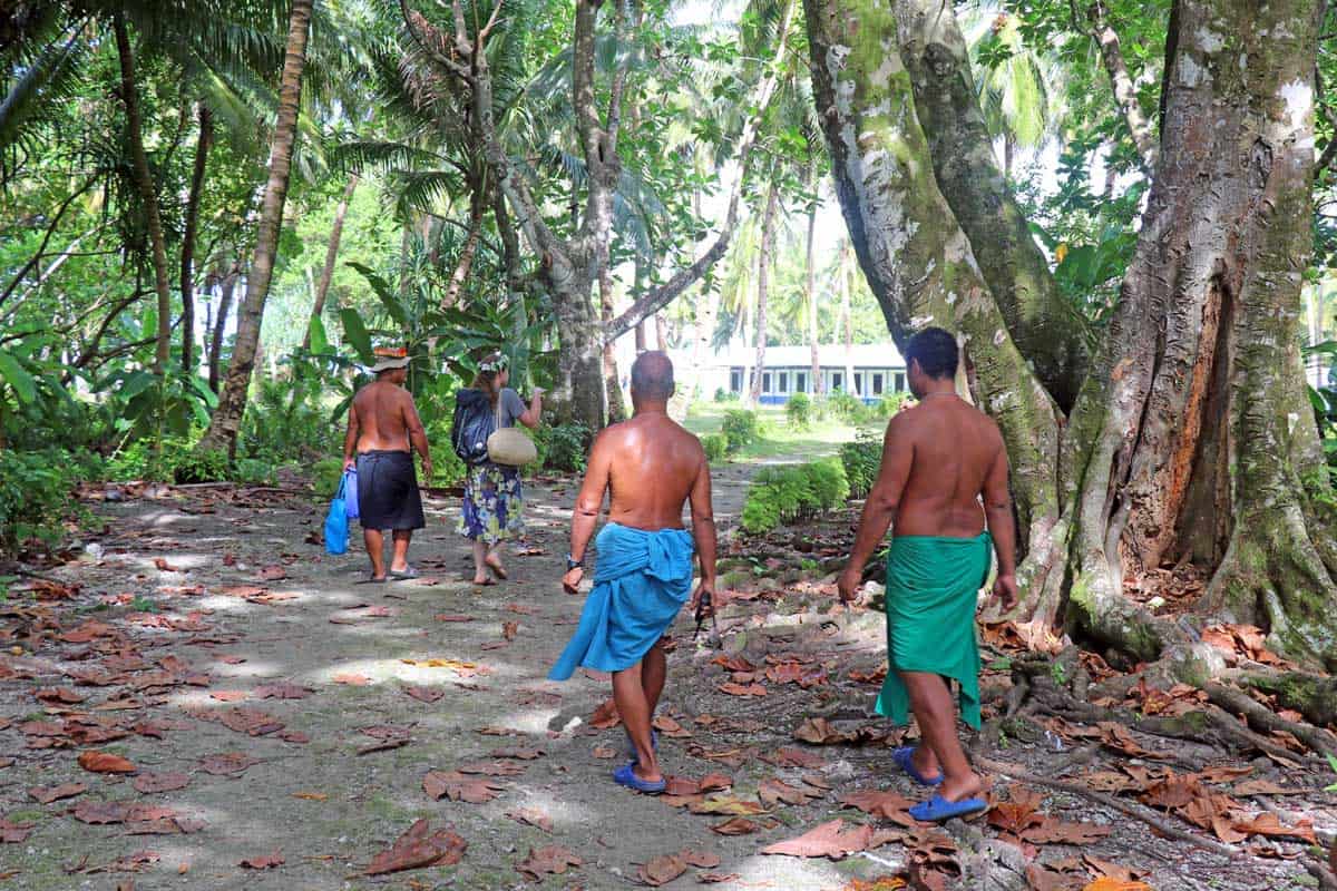 Men wearing traditional attire on on the outer island of Woleai in Yap