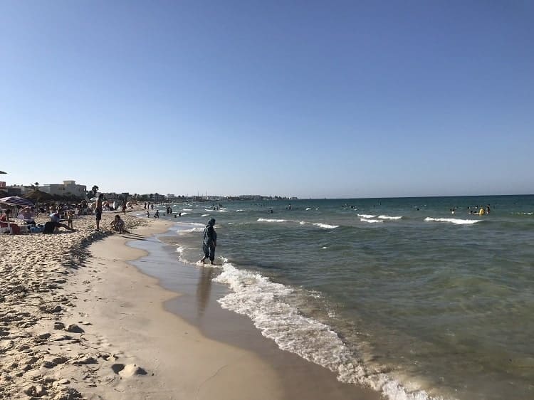 People enjoy the Mediterranean Sea.