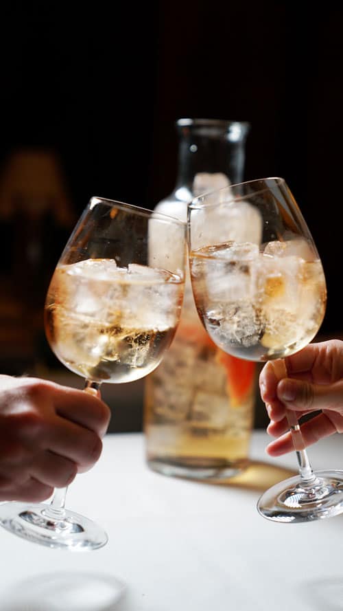 A toast of Rosé at The Polo Bar.