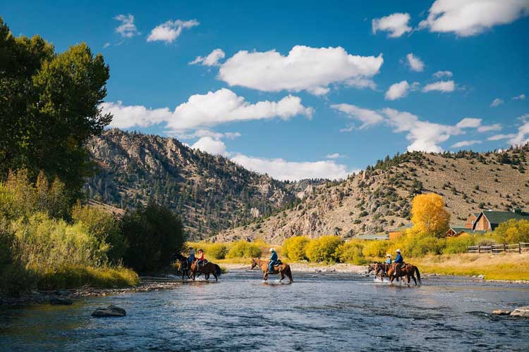 Horseback riding is a highlight at many dude ranches