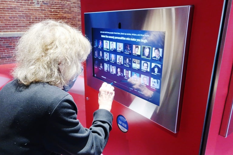 The author selecting her humor profile at the National Comedy Center in Chautauqua, New York. Photo by Victor Block