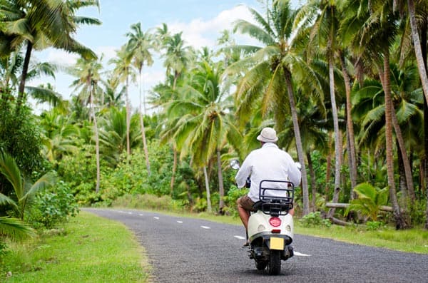 Scooter transportation around the lush Aitutaki Island