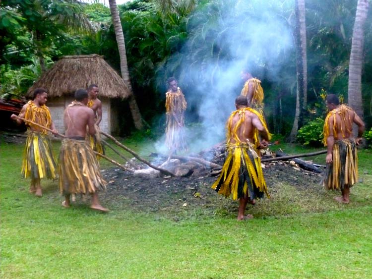 Brave warriors prepare to walk on hot coals in a typical ceremony. 