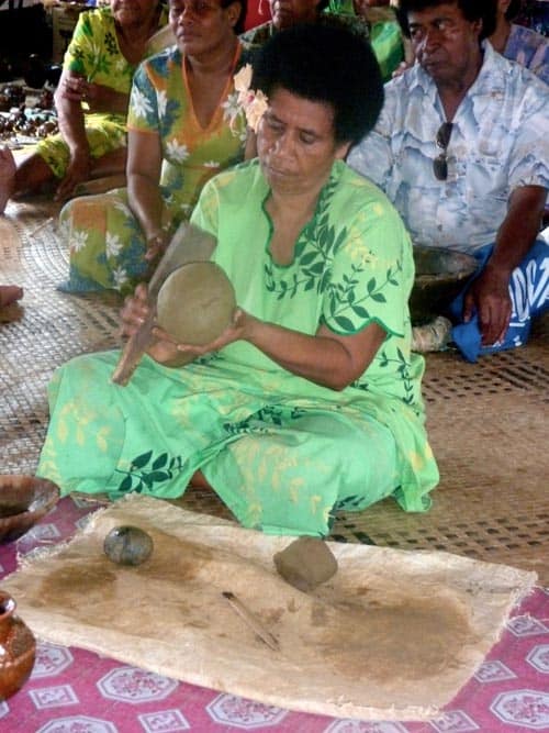 A woman makes pottery using primitive tools in Lawai Village known for its hand-made pottery.