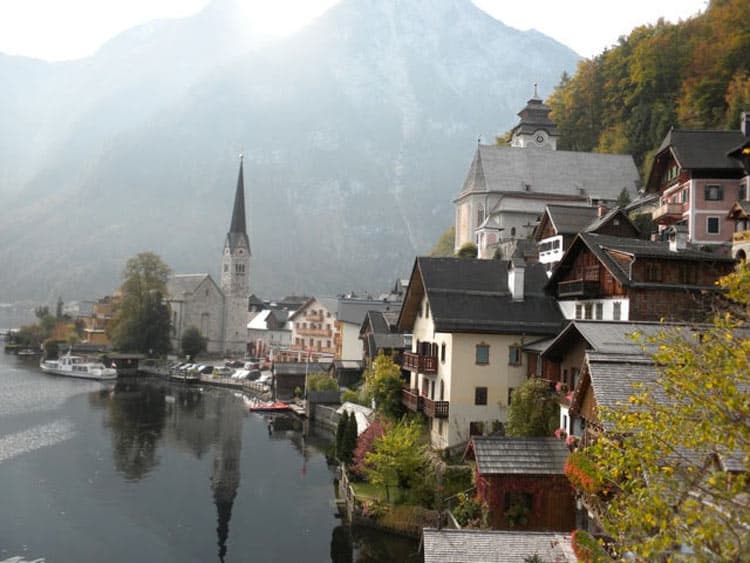 The picturesque fairytale village of Hallstatt, Austria is a small town in Europe waiting to romanticize your destination. Photo by Janna Graber