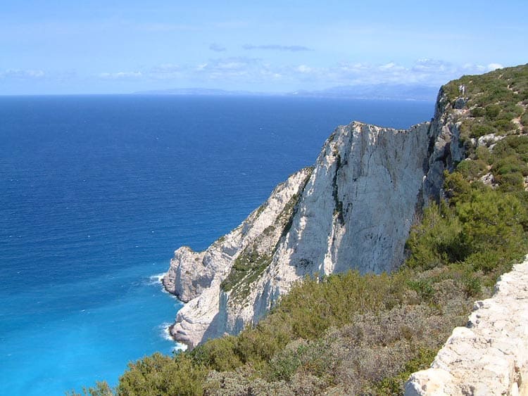 Zakynthos provides a picturesque view of crystal blue water of Greece. CC Image by Chris Hills