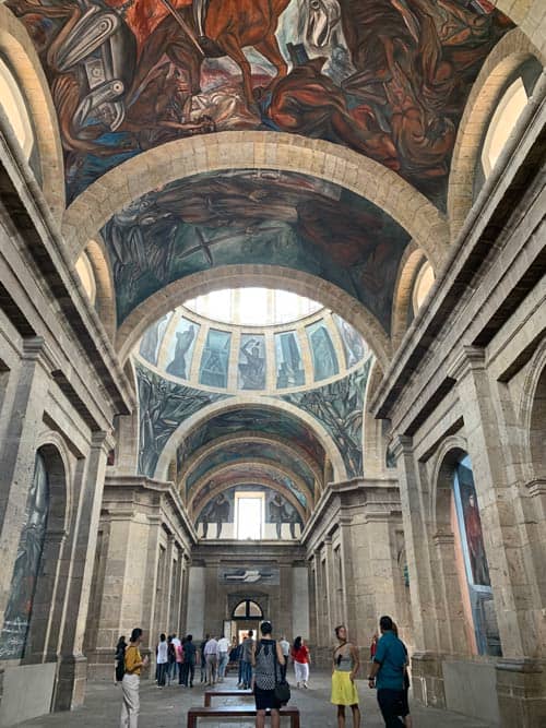 The Instituto Cultural Cabañas tells a story through murals on the walls, ceiling and domes by José Clemente Orozco. Photo by Maribeth Mellin