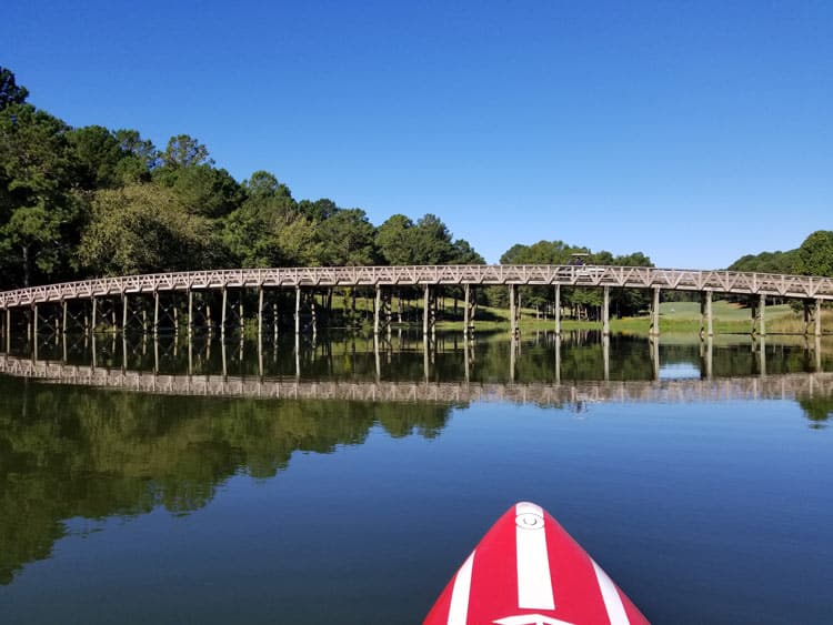 Paddleboarding around the Ritz Carlton will take you near the Lake Oconee Golf Course. Photo by Carrie Dow