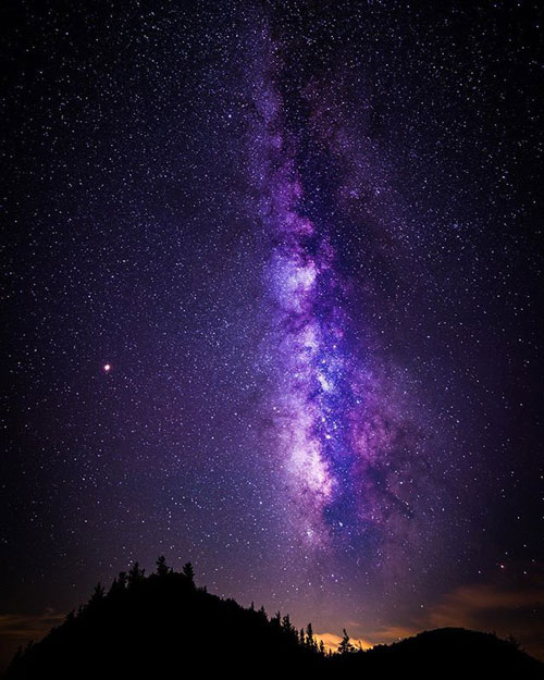 Stargazing is perfect in the Western North Carolina Mountain towns where  stars can be seen splashed amongst the night sky. Photo by David Gardner Photography