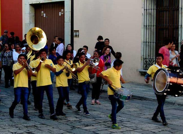 The streets around the Central Plaza of Oaxaca teem with non-stop parades, called calendas, each one proceeded by a brass band. Photo by Carol L. Bowman