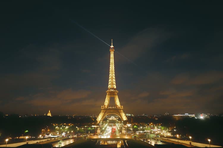 The Eiffel Tower totally illuminated at night in Paris