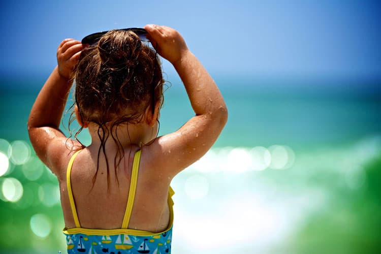 Kids enjoy the fun in the sun and ocean at the beaches of Destin, Florida