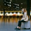 Travel in airport with masks during pandemic.