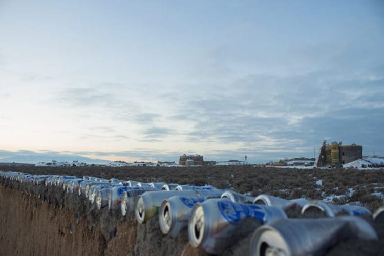 Earthship construction utilizes cans and bottles as materials to build these unique structures. Photo by Sterling Stowe.