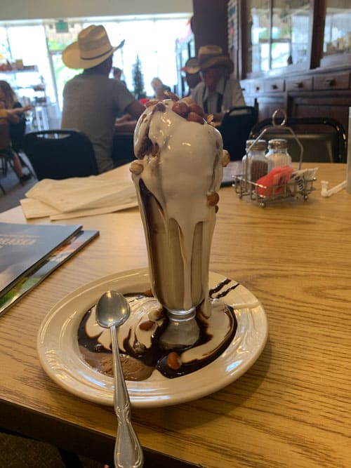 The delicious Tin Roof Sundae was invented in Potter, Nebraska. Photo by Janna Graber