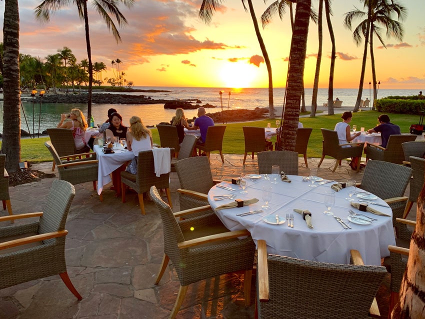 Sunset dining at Brown's Beach House on the Island of Hawaii. Photo by Benjamin Rader