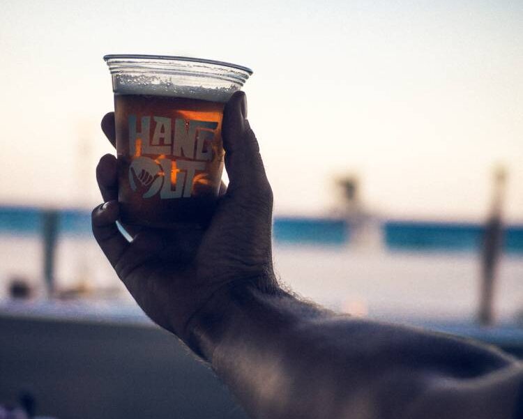 Enjoying a beverage on the beach