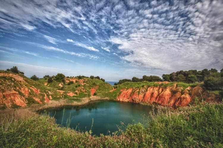 Cava di Bauxite e laghetto in Otranto, Italy