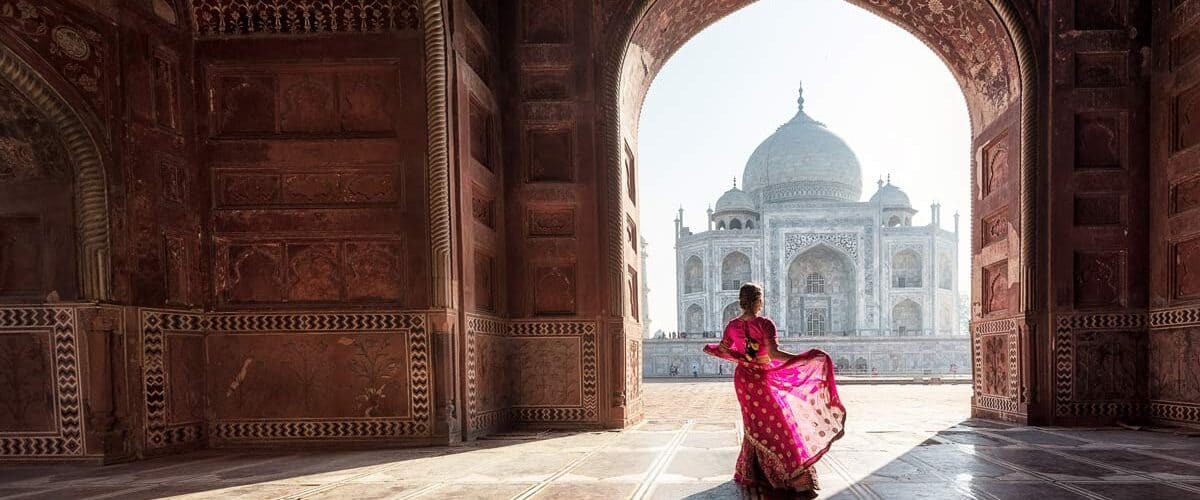 Fascinating contrasts in front of Taj Mahal in India.