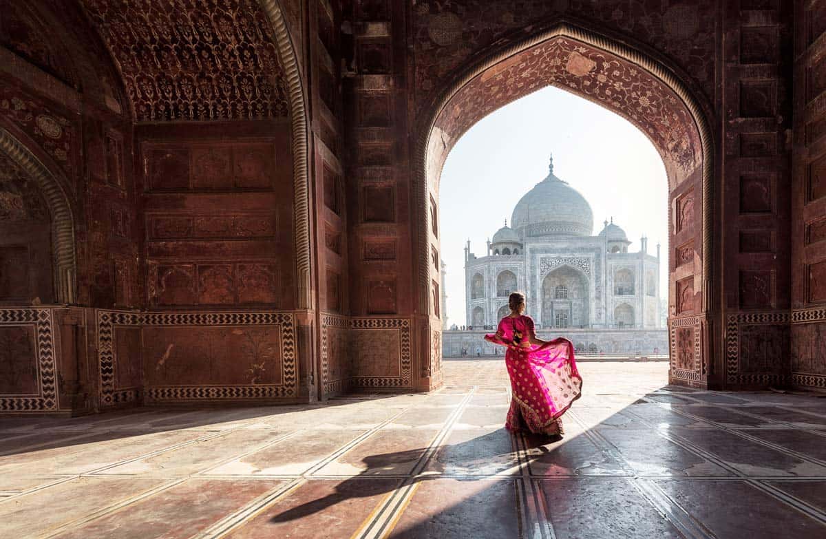 Fascinating contrasts in front of Taj Mahal in India.