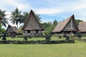 Building traditional homes on island of Yap.