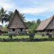 Building traditional homes on island of Yap.