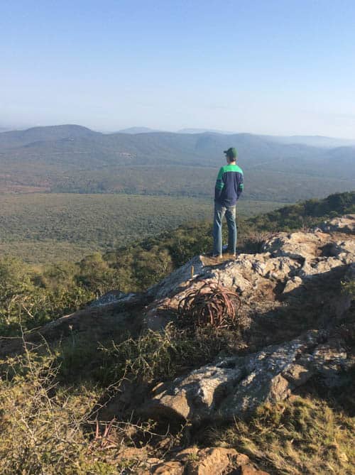 Community Tourism. The author takes in the scenery from Shewula Mountain Camp