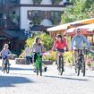 Family Biking in Vail Village by Jack Affleck