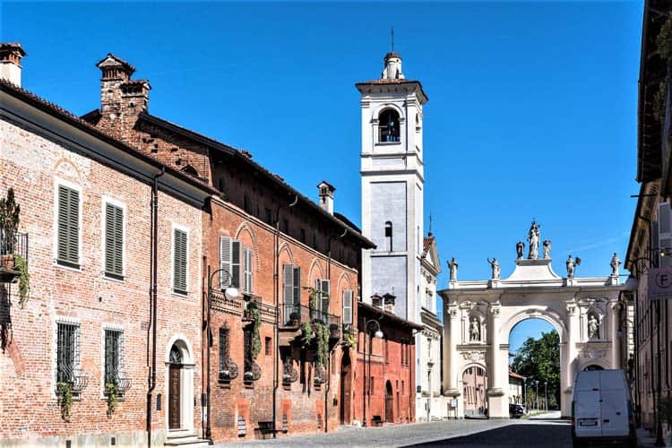 The Triumphal Arch in Cherasco is flanked by Sant Agostino Church. Photo by Pikappa/Dreamstime.com