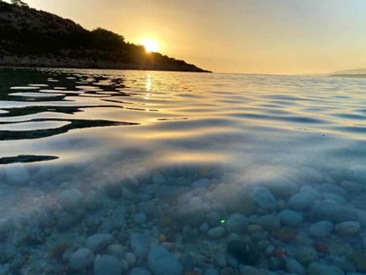 Sunset over water in Chios