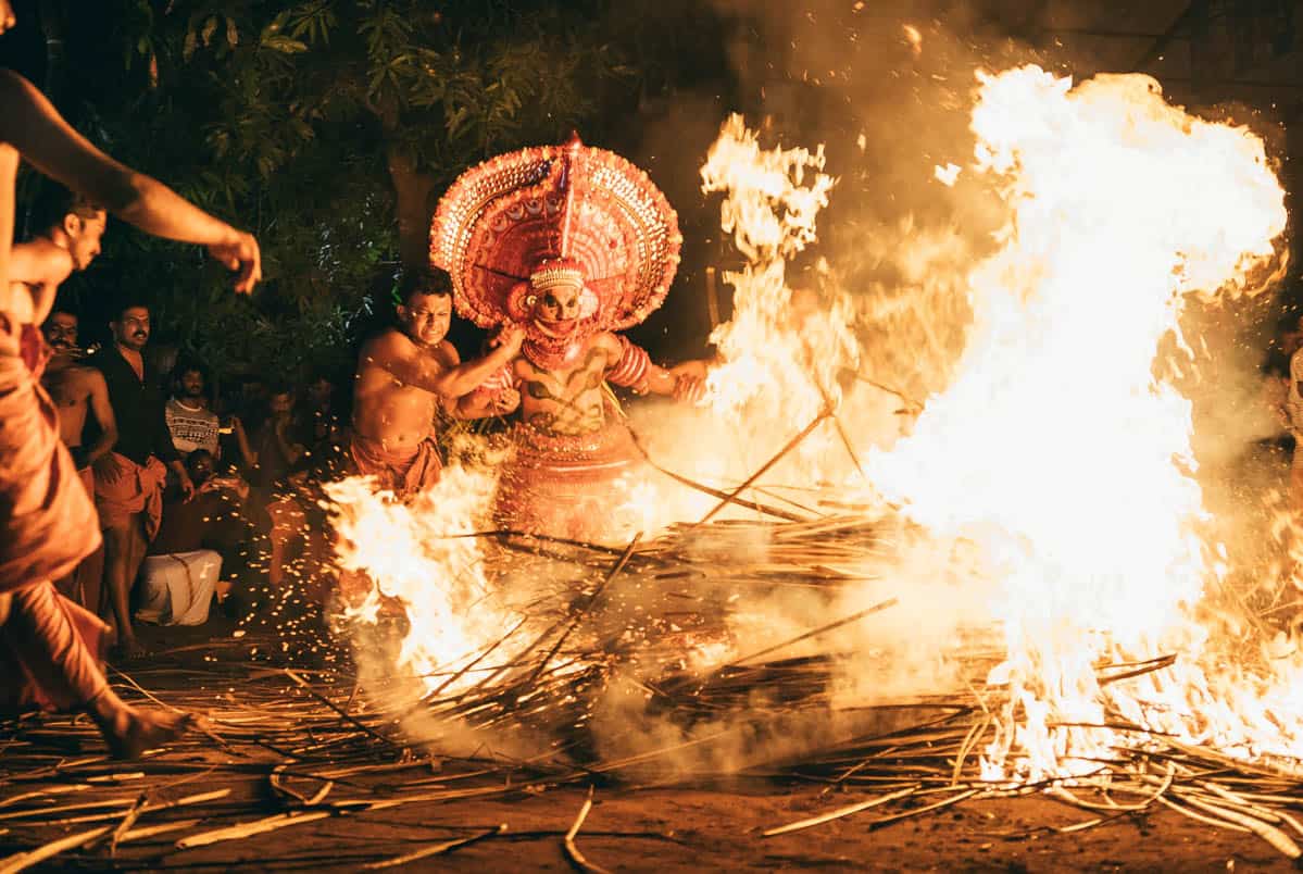 Experience Intense and Colorful Theyyam Fire Ceremony in Kerala India Experience Intense and Colorful Theyyam Fire Ceremony in Kerala India
