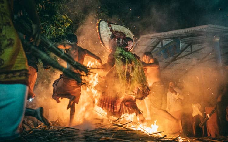 Theyyam Running barefoot through the fire
