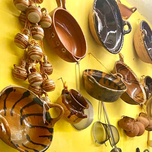 Cherished pots and pans adorn the walls