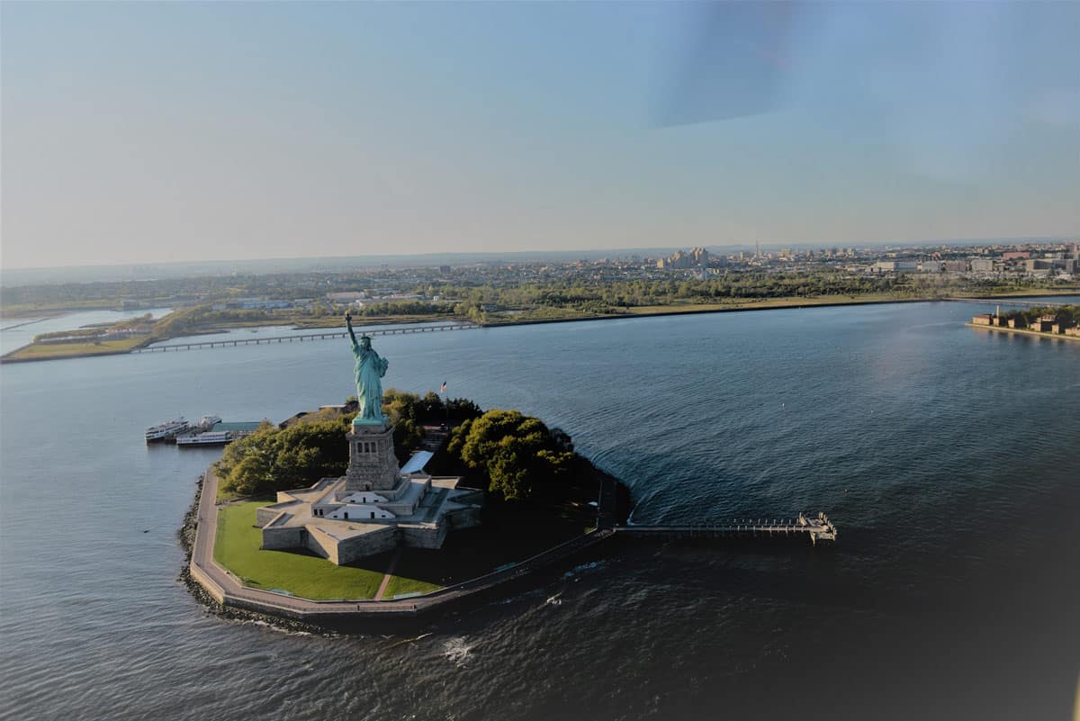 The Statue of Liberty dominates one of New York City’s best-known islands. Photo by Gilad Fiskus/Dreamstime