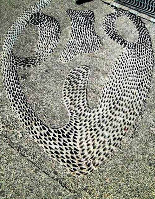 Sewer designs are among the many unusual attractions along the Malecon in Puerto Vallarta. Photo by Victor Block